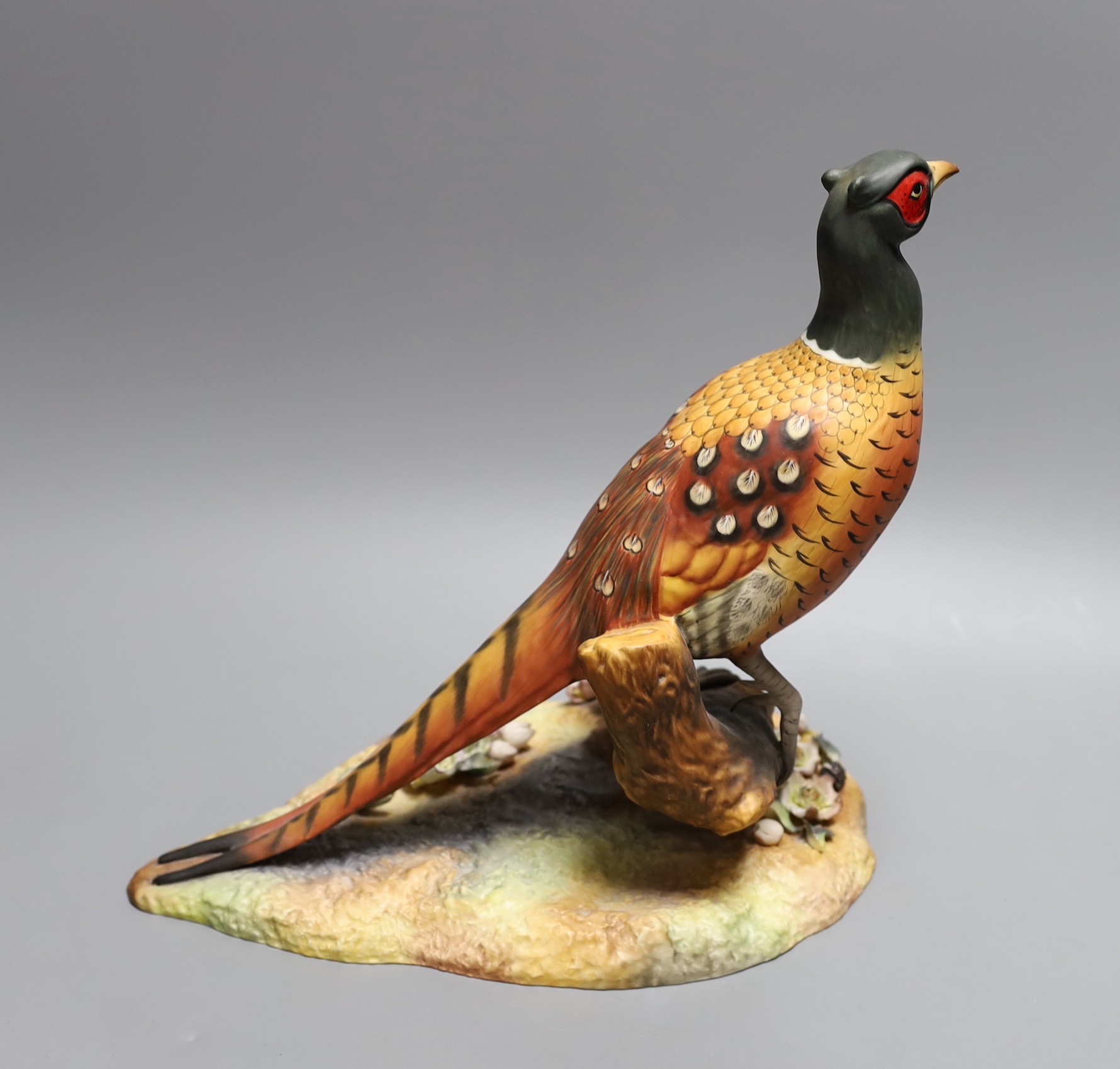 A large Royal Crown Derby pheasant, cased, 28cm